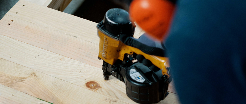 Nail gun used in the production of a custom pallet.